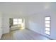 Bright, expansive bathroom with a soaking tub, abundant natural light, and neutral color palette at 7990 42Nd N St, Pinellas Park, FL 33781