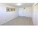 A bright, vacant bedroom with wood-look flooring is ready for the new owner's personal touch at 7990 42Nd N St, Pinellas Park, FL 33781