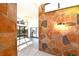 A light and bright foyer with stone walls and access to the living room at 7990 42Nd N St, Pinellas Park, FL 33781