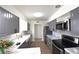 Spacious kitchen featuring modern appliances, farmhouse sink, and ample cabinet space at 7990 42Nd N St, Pinellas Park, FL 33781