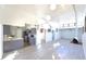 Open concept living and kitchen area with modern finishes and plenty of natural light at 7990 42Nd N St, Pinellas Park, FL 33781