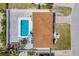 Aerial view of property with pool, roof, and yard at 8517 43Rd W Ave, Bradenton, FL 34209