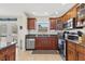 Well-equipped kitchen featuring stainless steel appliances, ample cabinets, and granite countertops at 8517 43Rd W Ave, Bradenton, FL 34209