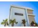 Exterior view of Marina Bay Villas featuring its address and landscaping at 870 N Osceola Ave, Clearwater, FL 33755