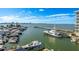 Aerial view of the harbor showcasing a variety of boats, waterfront docks, and clear blue skies at 870 N Osceola Ave, Clearwater, FL 33755