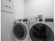 Laundry room with a front load washer and dryer at 870 N Osceola Ave, Clearwater, FL 33755