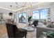 Bright living room with waterfront views, modern furnishings, and hardwood floors at 870 N Osceola Ave, Clearwater, FL 33755