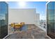 Relax on this stylish patio with comfortable seating and stunning views, perfect for entertaining and enjoying the scenery at 870 N Osceola Ave, Clearwater, FL 33755