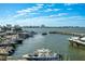 Waterfront view of boats and a city skyline, with clear blue skies and light cloud cover at 870 N Osceola Ave, Clearwater, FL 33755