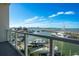 Enjoy unobstructed views of the harbor from a spacious balcony with glass railings at 870 N Osceola Ave, Clearwater, FL 33755