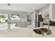 Bright kitchen featuring stainless steel appliances, ample counter space, and modern finishes at 915 Brittany Park Blvd, Tarpon Springs, FL 34689
