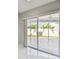 Covered patio view featuring sliding glass doors at 915 Brittany Park Blvd, Tarpon Springs, FL 34689