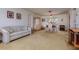 Spacious open-concept living and dining area with neutral color palette at 9170 Dupont Ave, Spring Hill, FL 34608