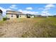 This spacious backyard offers plenty of room for outdoor activities and recreation at 9505 Lemon Drop Loop, Ruskin, FL 33573