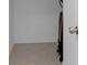 This walk-in closet offers ample storage with its clean, tiled floor and white walls at 9505 Lemon Drop Loop, Ruskin, FL 33573