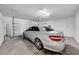Spacious two-car garage featuring ample room for parking and storage at 9505 Lemon Drop Loop, Ruskin, FL 33573