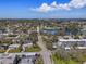 Aerial view of the property near a large pond and roadways at 9862 48Th N Ave, St Petersburg, FL 33708