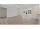 Bright and open floorplan with wood-look floors and natural light at 9862 48Th N Ave, St Petersburg, FL 33708