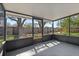 The covered screened in lanai offers an outdoor living space at 9862 48Th N Ave, St Petersburg, FL 33708