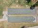 Overhead shot of community bocce ball courts with natural grass surroundings at 14191 Heritage Landing Boulevard # 1234, Punta Gorda, FL 33955