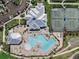 Aerial photo showing community pool, clubhouse, and tennis courts, highlighting recreational facilities at 14191 Heritage Landing Boulevard # 1234, Punta Gorda, FL 33955