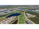 An aerial view of the community showing golf course, lakes and surrounding area at 14191 Heritage Landing Boulevard # 1234, Punta Gorda, FL 33955