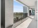 Balcony with black railings and stucco columns overlooking the community at 14191 Heritage Landing Boulevard # 1234, Punta Gorda, FL 33955
