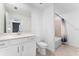 This bathroom features a bathtub with tile surround and a white single sink vanity at 14191 Heritage Landing Boulevard # 1234, Punta Gorda, FL 33955