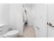 The bathroom features a toilet and bathtub, plus a tiled floor at 14191 Heritage Landing Boulevard # 1234, Punta Gorda, FL 33955
