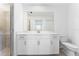 Bathroom features a white vanity with modern fixtures and tile floors at 14191 Heritage Landing Boulevard # 1234, Punta Gorda, FL 33955