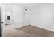 A well-lit bedroom features neutral carpeting and a walk in closet at 14191 Heritage Landing Boulevard # 1234, Punta Gorda, FL 33955