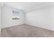 Inviting bedroom with plush carpet, natural light and bright walls at 14191 Heritage Landing Boulevard # 1234, Punta Gorda, FL 33955