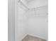 Walk-in closet with carpet flooring and wire shelving at 14191 Heritage Landing Boulevard # 1234, Punta Gorda, FL 33955