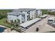 Beautiful view of modern condo building with covered parking and landscaping at 14191 Heritage Landing Boulevard # 1234, Punta Gorda, FL 33955