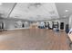 Spacious gym with wood floors and plenty of equipment for a complete workout at 14191 Heritage Landing Boulevard # 1234, Punta Gorda, FL 33955