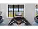 Close up of treadmill displaying a calming graphic of the local tennis courts at 14191 Heritage Landing Boulevard # 1234, Punta Gorda, FL 33955