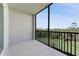 Screened lanai with view of trees provides a peaceful outdoor living space at 14191 Heritage Landing Boulevard # 1234, Punta Gorda, FL 33955