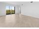 Bright, airy living room with sliding glass doors that open to a screened lanai at 14191 Heritage Landing Boulevard # 1234, Punta Gorda, FL 33955