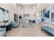 Bright lobby with high ceilings, neutral tones, artwork, and a view to the entryway at 14191 Heritage Landing Boulevard # 1234, Punta Gorda, FL 33955