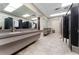 Well-lit commercial restroom featuring modern fixtures and spacious layout at 14191 Heritage Landing Boulevard # 1234, Punta Gorda, FL 33955