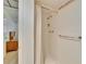 Tiled shower with shower curtain at 206 Andover N Pl # 96, Sun City Center, FL 33573