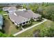 Beautiful home featuring a screened in porch, sidewalks, and detailed landscaping at 221 Sela Cove Cir, Apollo Beach, FL 33572