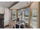 Cozy breakfast nook with large windows, neutral paint and natural light at 2515 S Ysabella Ave, Tampa, FL 33629