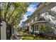 Street view of the townhome, featuring a well-manicured lawn and exterior paint at 2515 S Ysabella Ave, Tampa, FL 33629
