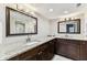 Spacious main bath boasting dual sinks, granite counters, and ample storage space at 2515 S Ysabella Ave, Tampa, FL 33629