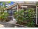 Enclosed porch area that provides shade and great views to the outdoors at 2515 S Ysabella Ave, Tampa, FL 33629