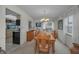 Bright dining room with wood table and chairs at 3111 Teal Ter, Safety Harbor, FL 34695