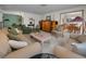 Spacious living room with neutral tones and classic furniture at 3111 Teal Ter, Safety Harbor, FL 34695