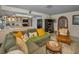Comfortable living room open to the kitchen, perfect for entertaining and relaxation at 3111 Teal Ter, Safety Harbor, FL 34695