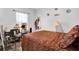 Cozy bedroom with natural light, decorative accents, and plush bedding at 35530 Shade Fern Ln, Zephyrhills, FL 33541